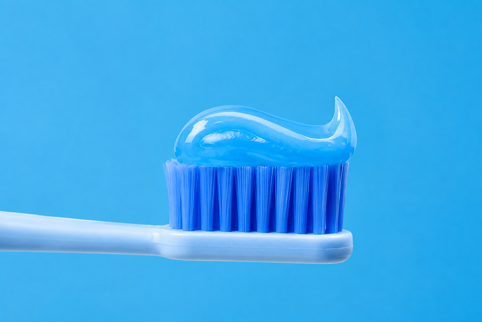 Toothbrush with toothpaste shown fully inside the preventive oral-care visual
