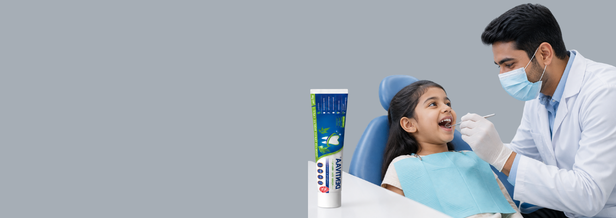 Indian dentist carrying out a professional oral examination