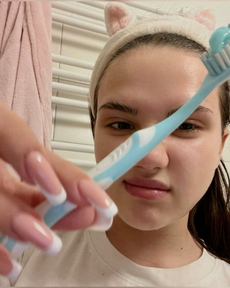 Young Indian girl practising daily brushing for a healthier smile